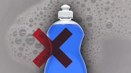 Dish soap bottle overlaid with a red X.